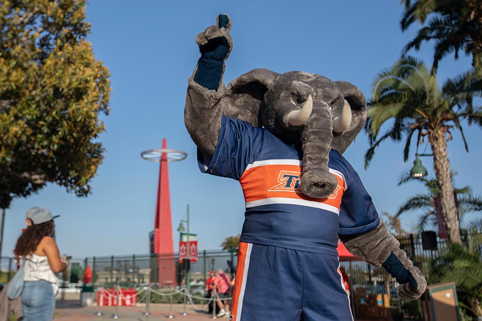 Tuffy mascot with hand raised outside the Angels Stadium