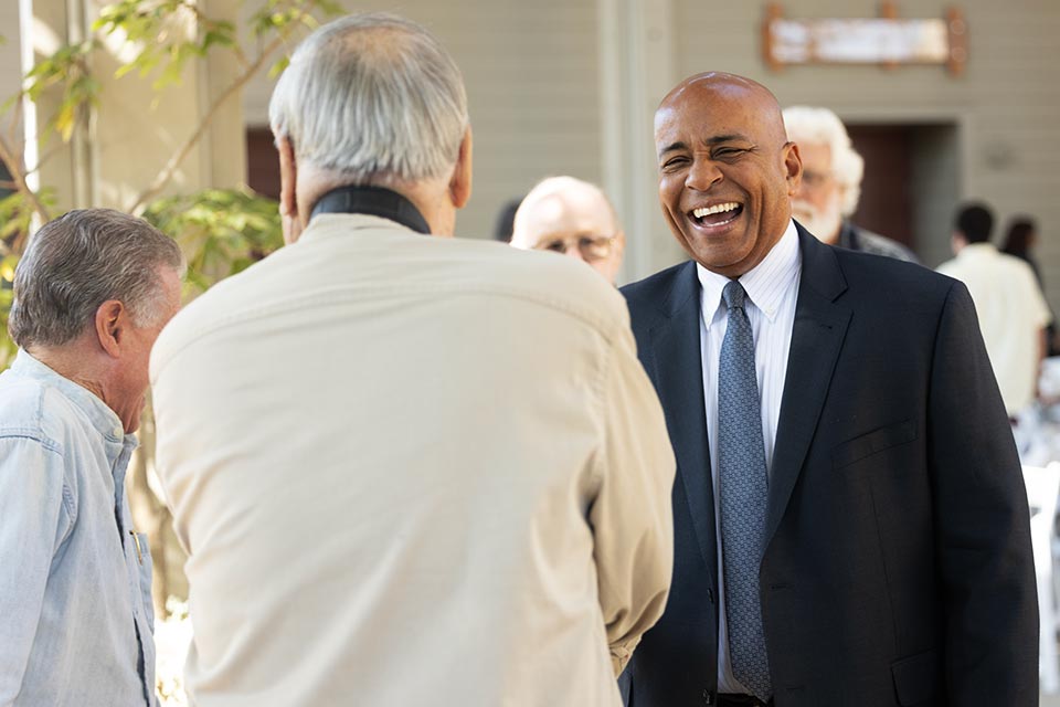 President Rochon laughing with an emeritus