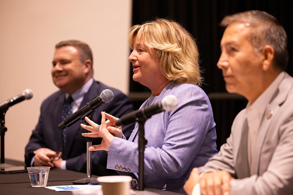 A panelist speaking to the audience