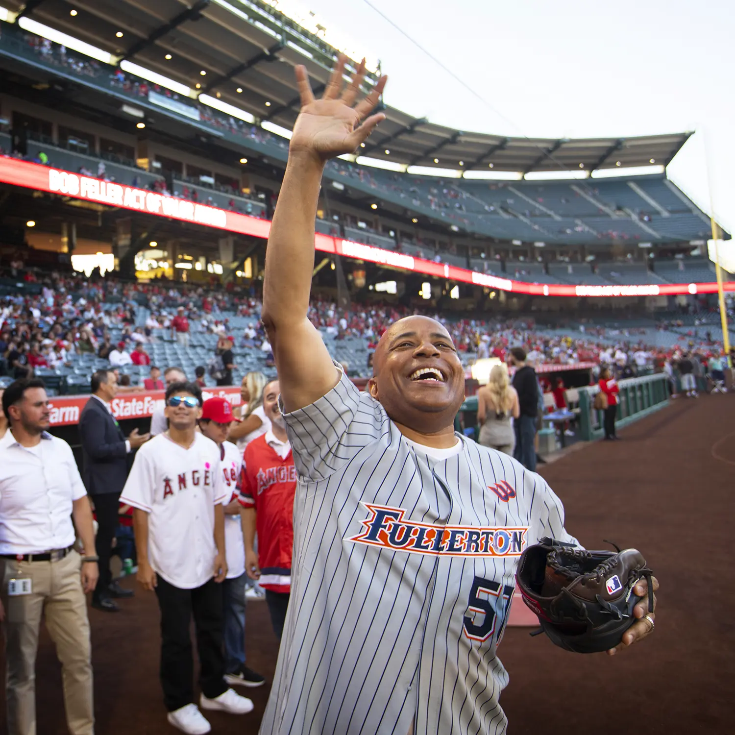 President Rochon at Angel Stadium waving to the crowd